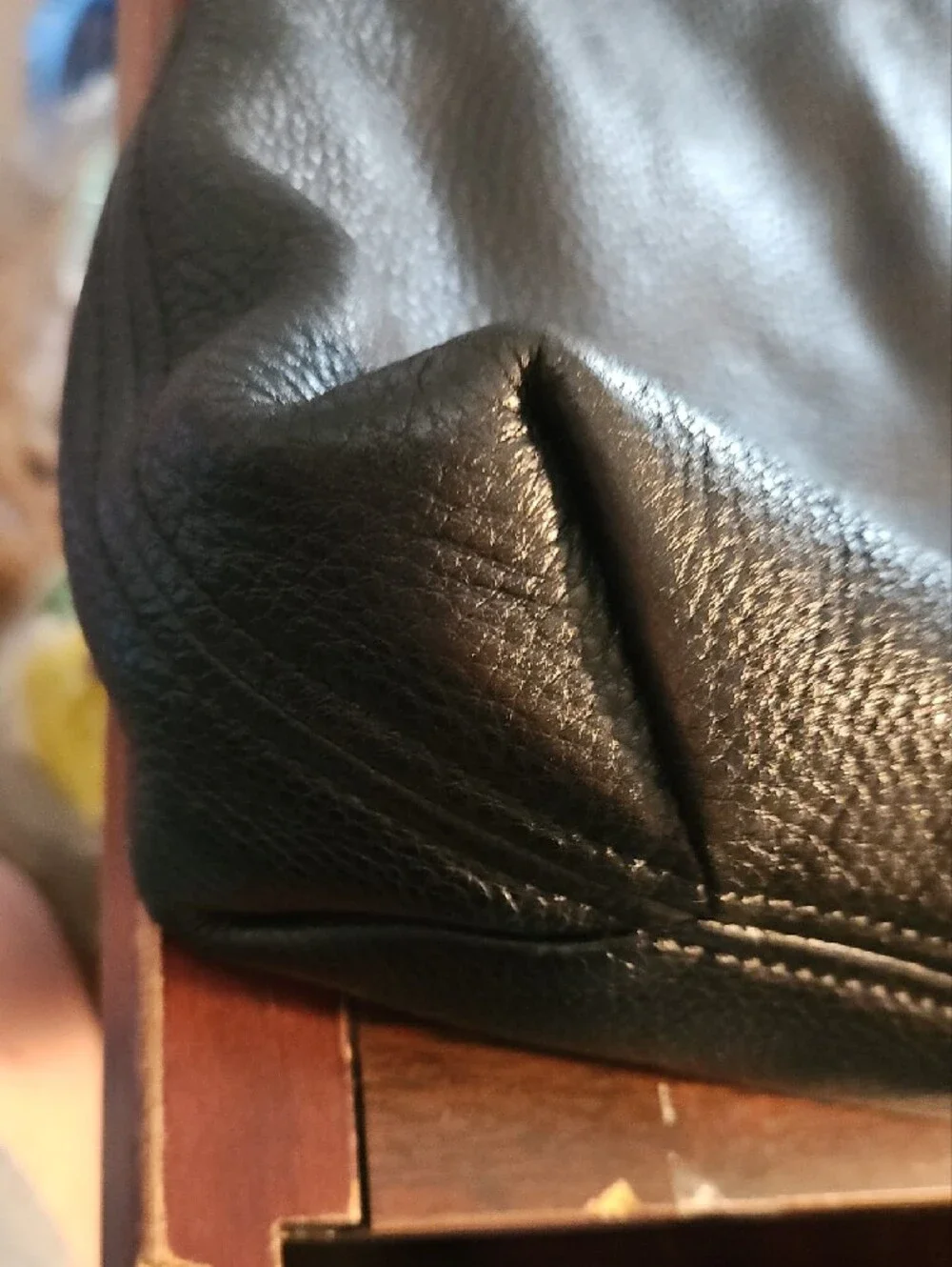 Michael Kors Black Pebbled Leather Hobo with Tassel and Gold Plaque